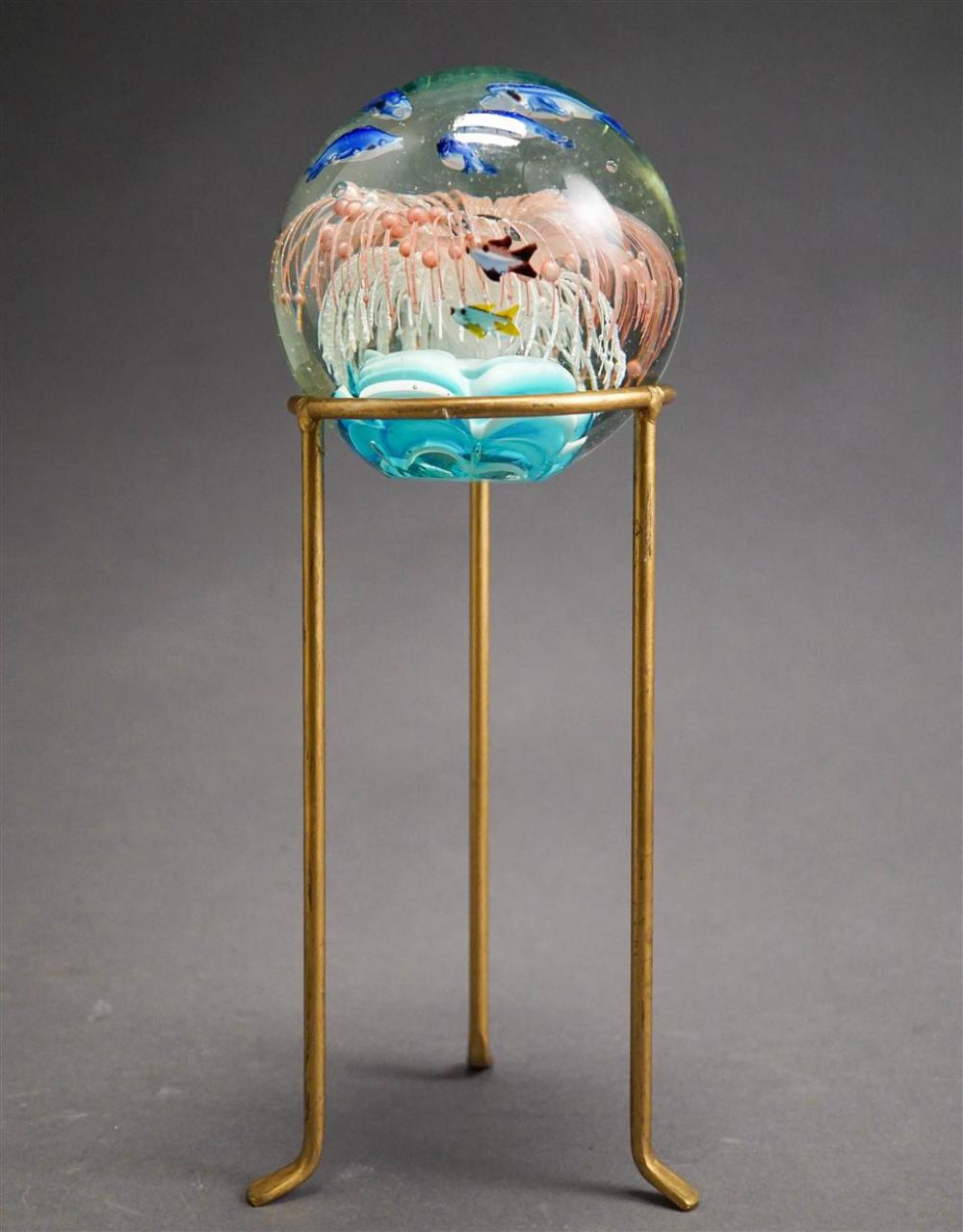 CONTEMPORARY GLASS PAPERWEIGHT ON A