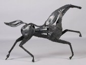 CONTEMPORARY METAL FIGURE OF A