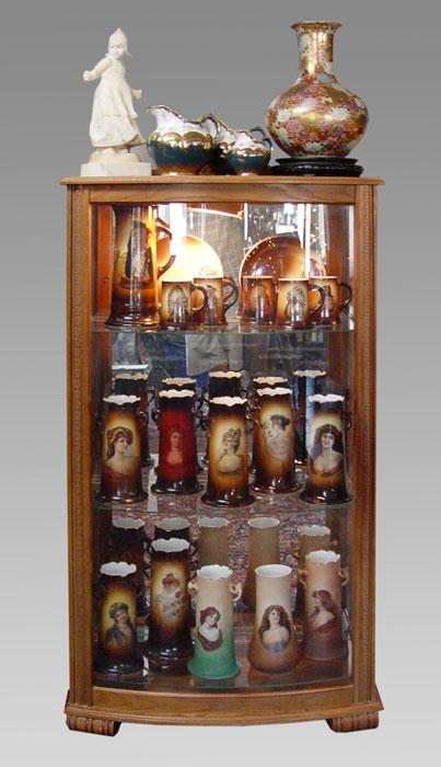 CONTEMPORARY OAK BOW FRONT CABINET: