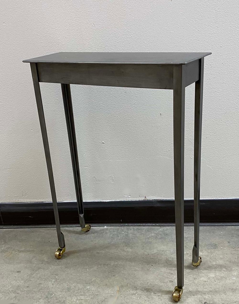 CONTEMPORARY POLISHED METAL SIDE