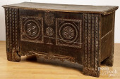 CONTINENTAL CARVED OAK COFFER,