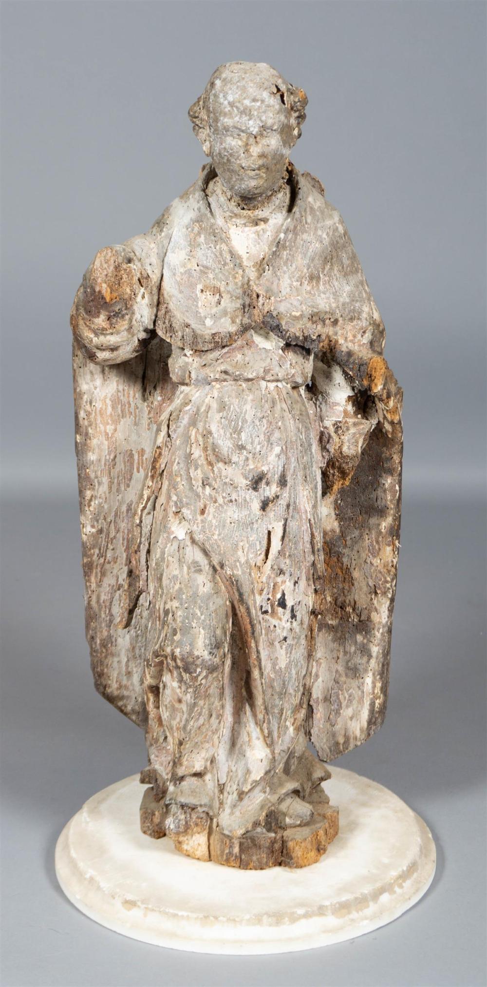 CONTINENTAL CARVED PINE FIGURE OF A