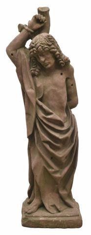 CONTINENTAL CARVED STONE FIGURE
