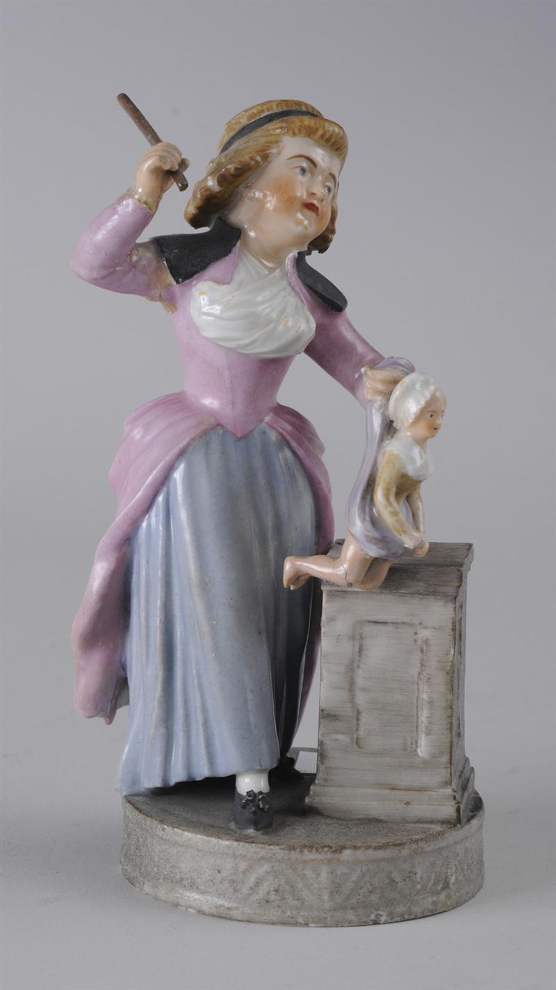 CONTINENTAL PORCELAIN FIGURE