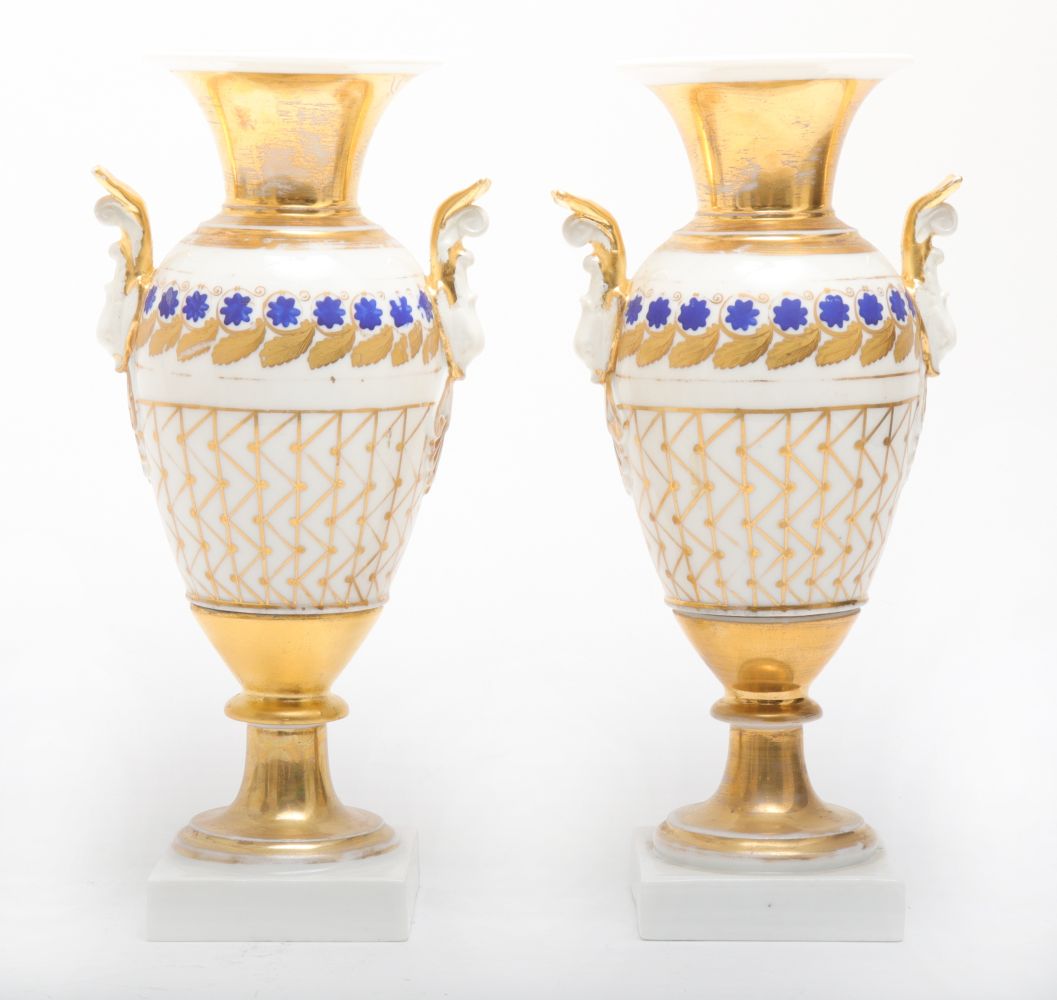 CONTINENTAL PORCELAIN URNS W.
