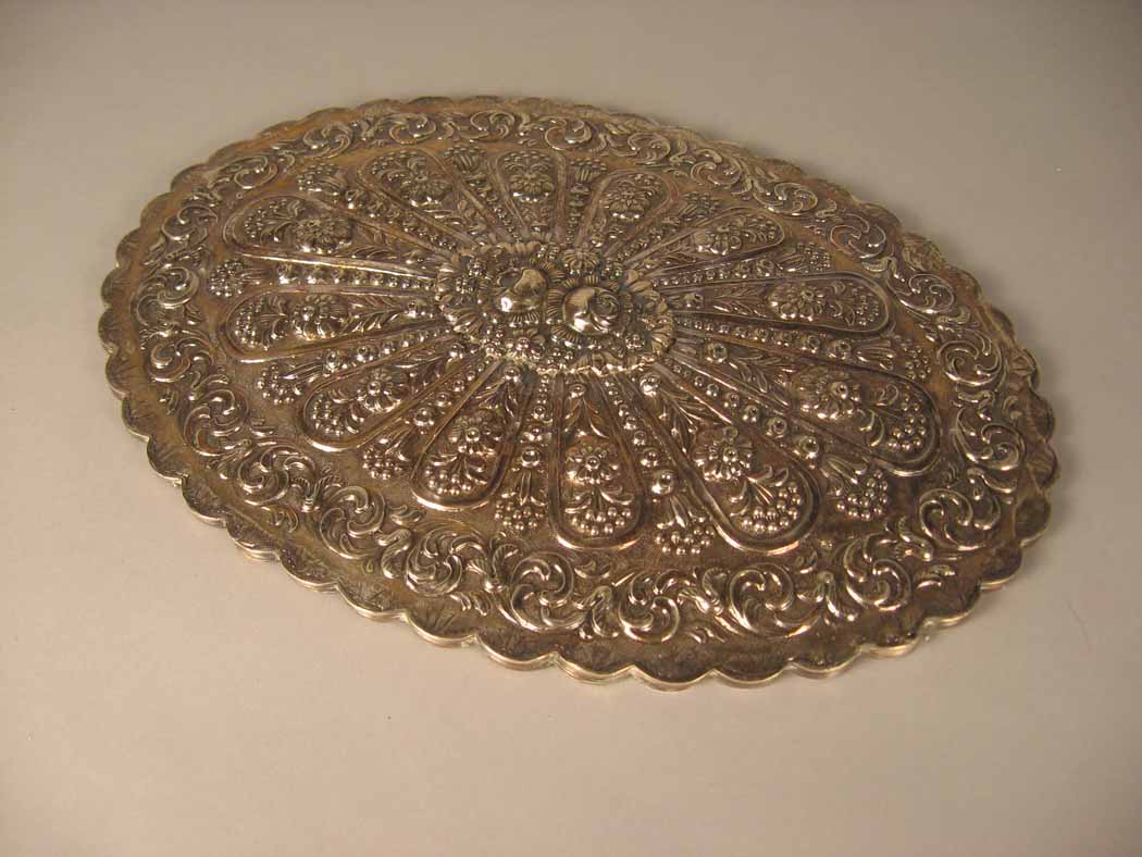 Continental silver repousse mirror