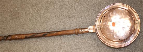 Copper bed warmer with turned