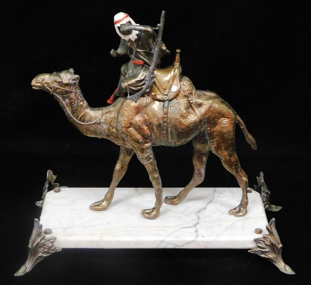 COPPER STATUE OF AN ARMED MAN