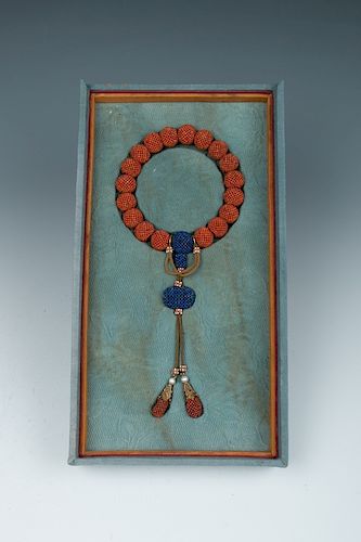 CORAL & AGARWOOD BEADED BRACELET,