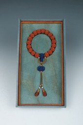 CORAL & AGARWOOD BEADED BRACEL