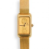 CORUM 18K GOLD INGOT WATCHDESC