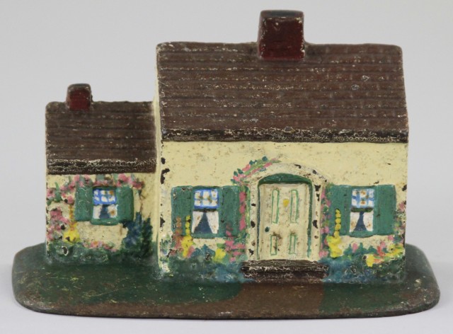 COTTAGE DOORSTOP Cast iron one