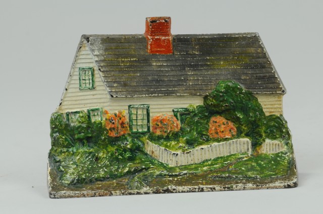 COTTAGE DOORSTOP ''Eastern