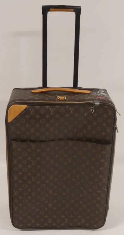 COUTURE. LOUIS VUITTON ROLLING