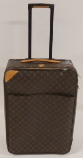COUTURE. LOUIS VUITTON ROLLING