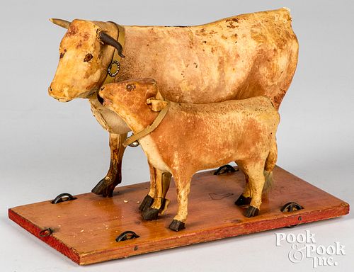 COW PULL TOY, CA. 1900Cow pull toy,