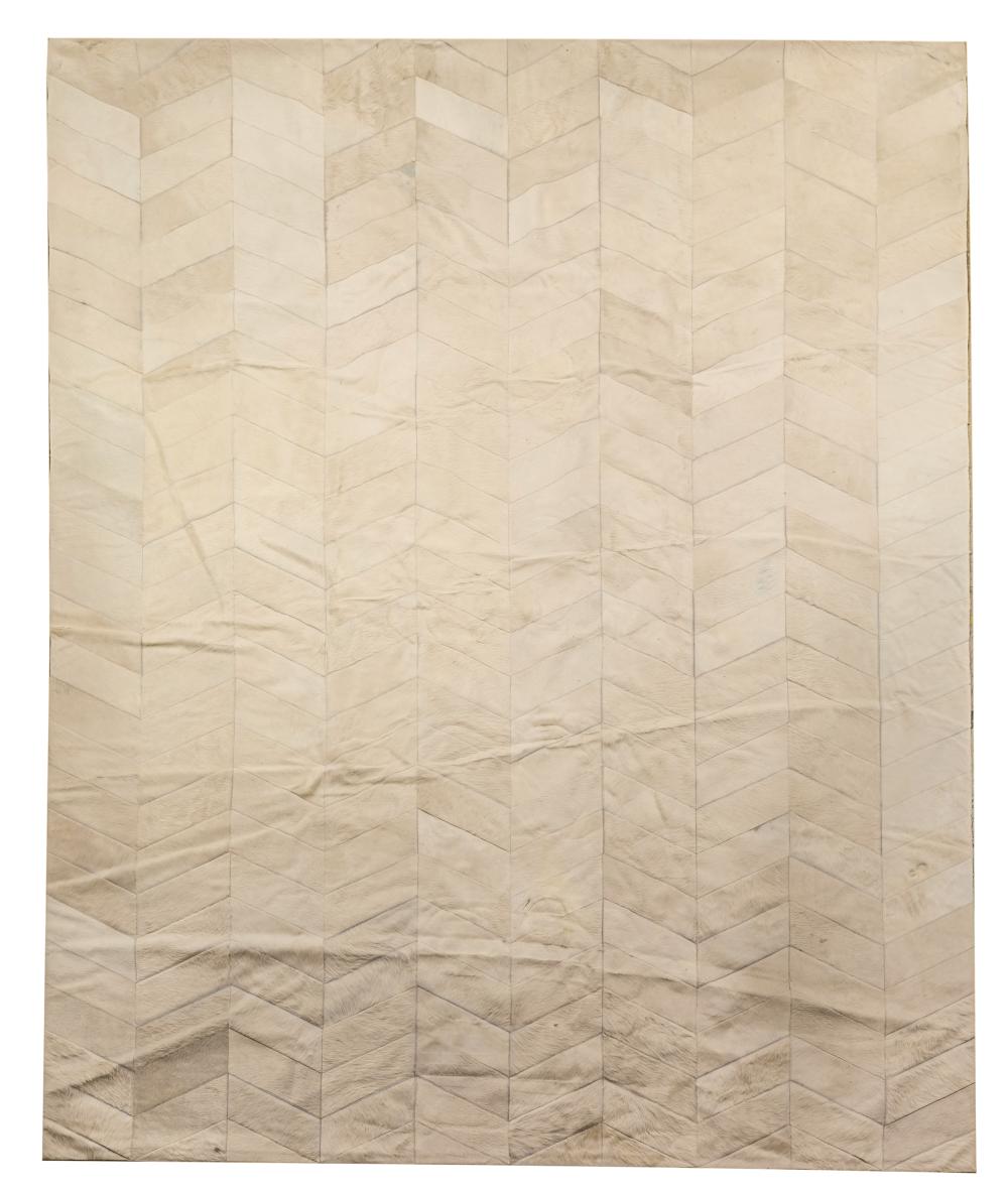 COWHIDE AREA RUGpieced in a