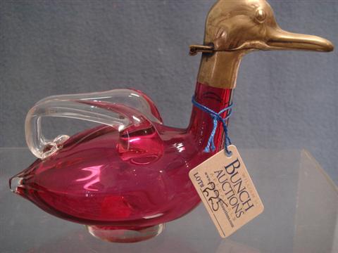 Cranberry glass duck cruet, clear