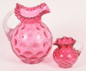 Cranberry glass pitchers; coin