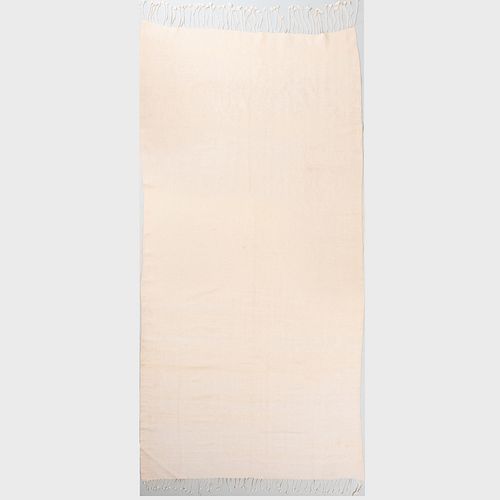 CREAM WOOL RUNNER AND A BROWN AND