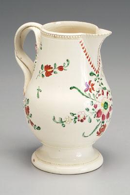 Creamware pitcher, double strap