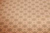 CREME AND GREEN BROADLOOM CARP