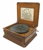 CRITERION OAK-CASED DISC COMB