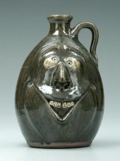 Crocker face jug, ceramic teet