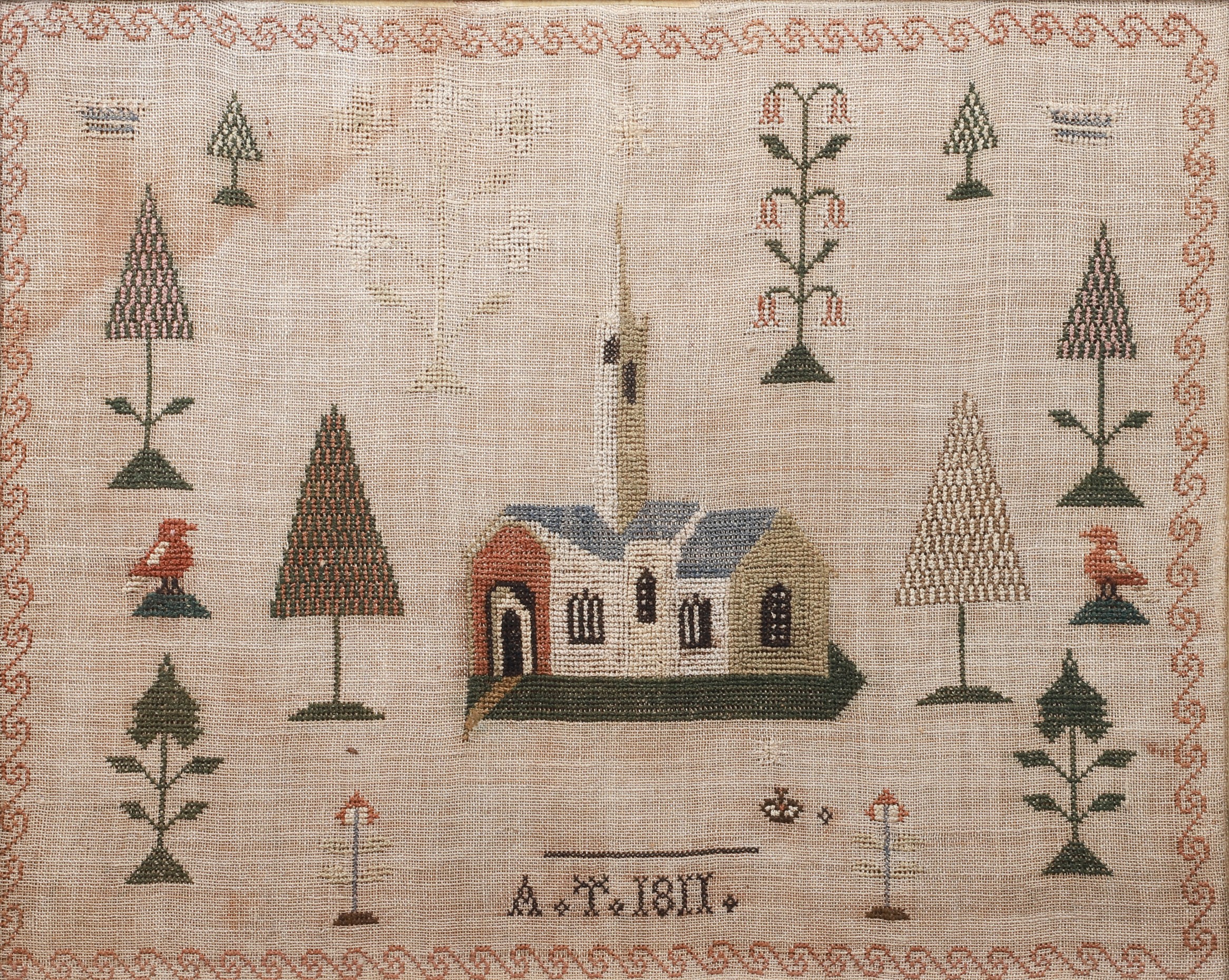 Cross stitch sampler, signed AT