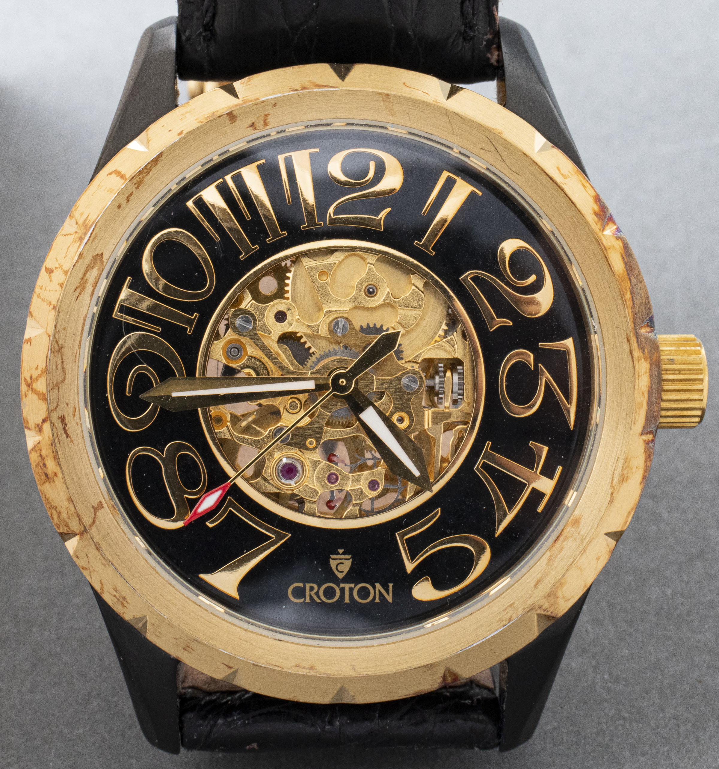 CROTON BLACK & GOLD-TONE SKELETON