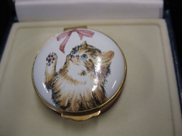 Crummels Enamel Box cat at play