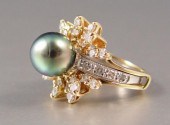 CULTURED BLACK PEARL AND DIAMO
