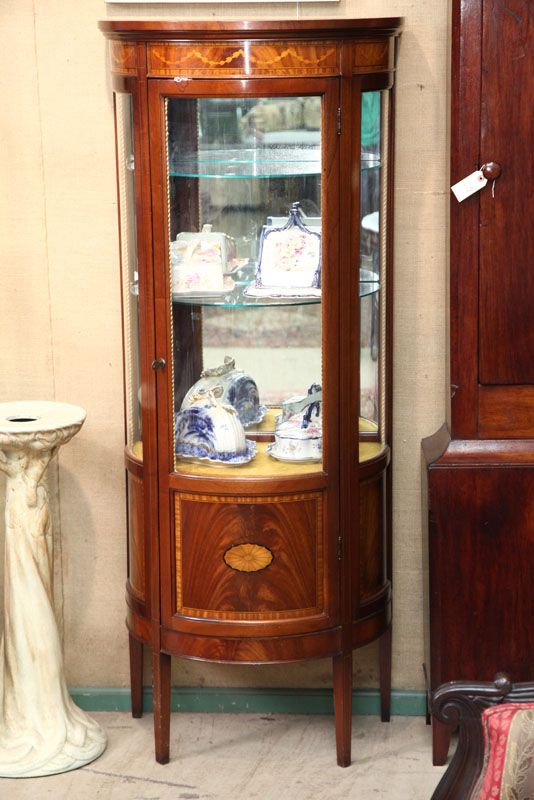 CURIO CABINET. Mahogany having a
