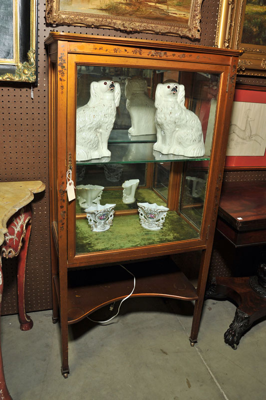 CURIO CABINET. Openwork metal