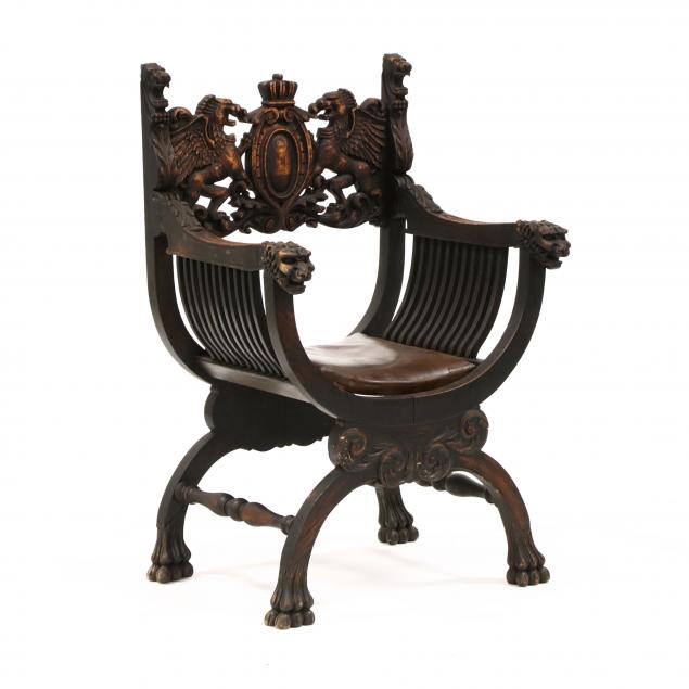 CURULE FORM CARVE OAK ARMCHAIR