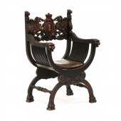 CURULE FORM CARVE OAK ARMCHAIR