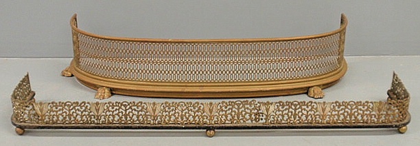 Curved brass fireplace screen