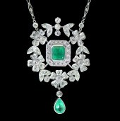 CUSTOM PLATINUM EMERALD & DIAM