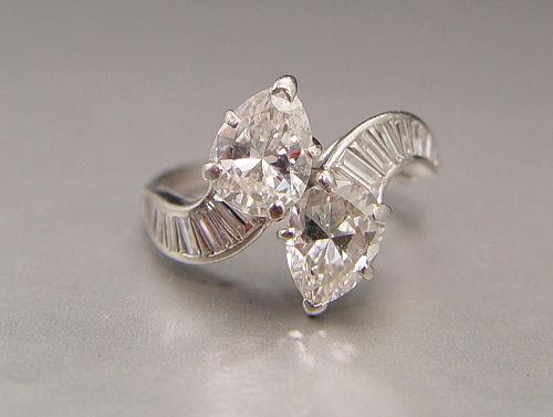 CUSTOM PLATINUM RING FEATURING 2
