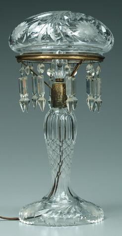 Cut glass lamp, domed shade above