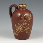 Cute perfume jug with carved b