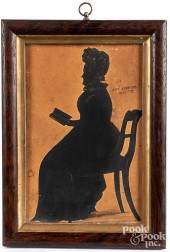 CUTWORK SILHOUETTE OF A SEATED