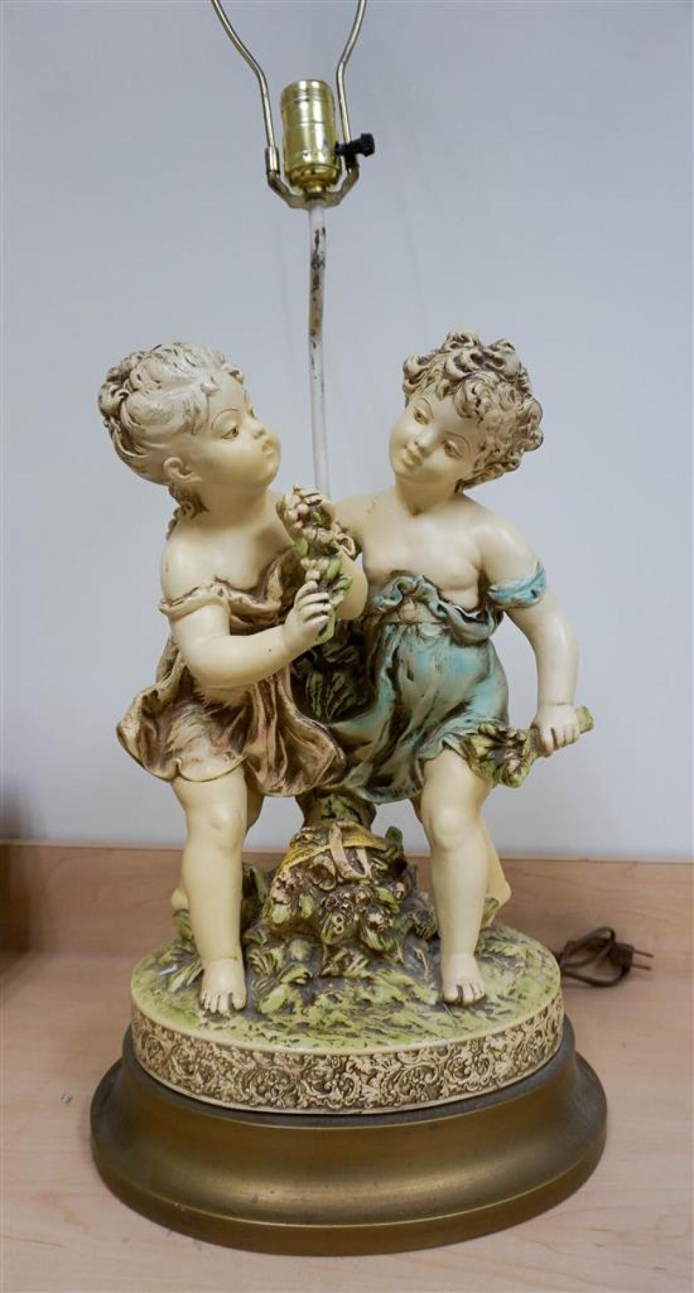 DECORATED PLASTER FIGURAL TABLE