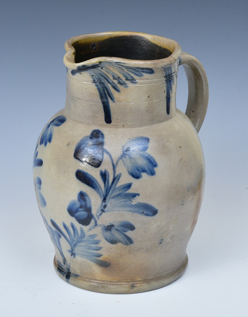 DECORATED STONEWARE PITCHER,
