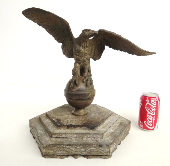 Decorative cast iron eagle on stone