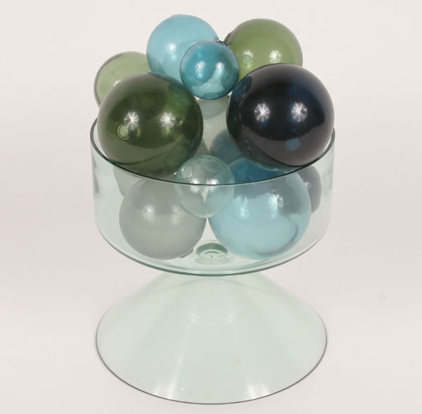 Decorative compote on conical base,