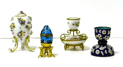 Decorative eggs and stands  four