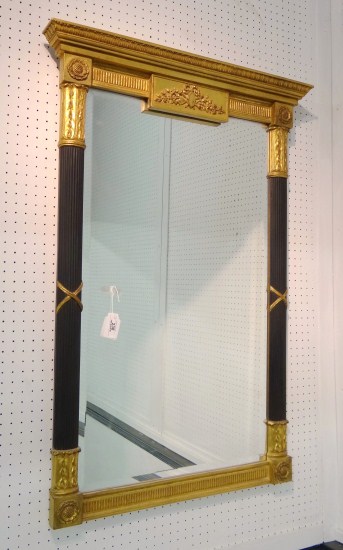 Decorative Empire style mirror.