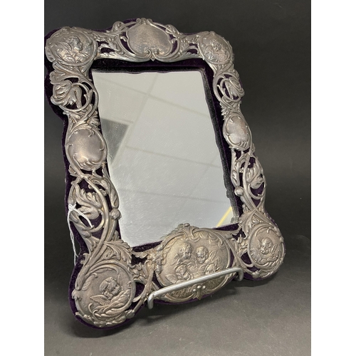 Decorative pierced silvered metal