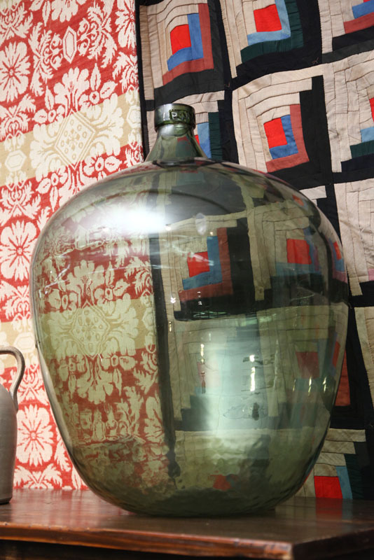DEMIJOHN. Green with a concave
